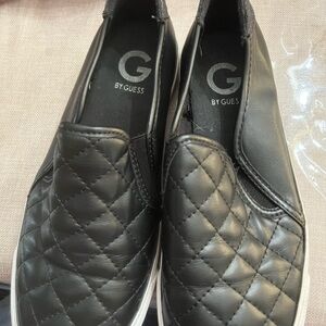 Black Guess slip in sneakers